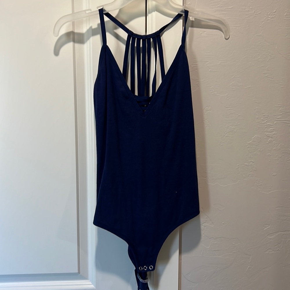 Blue body suit with razorback